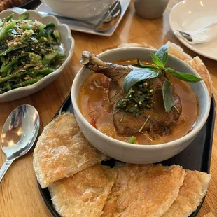Red duck curry w/ crispy Roti. Gailan Chinese broccoli (seasonal veg)