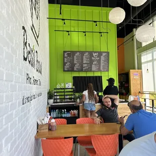 a group of people sitting at a table