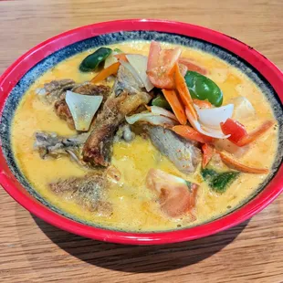 Flavorful pineapple ramen full of veggies with savory roast duck.