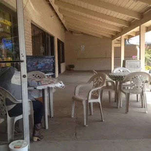 Outdoor seating also has a tv