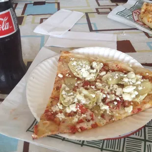Huge slice with artichoke hearts and goat cheese.