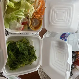 Seaweed salad and side salad with orange vinaigrette