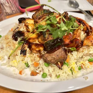 Fried rice combination with chicken, shrimp and beef