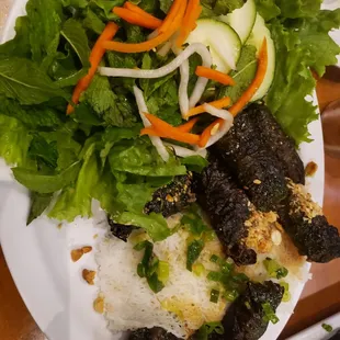 Vermicelli patties with betel leaf wrapped beef