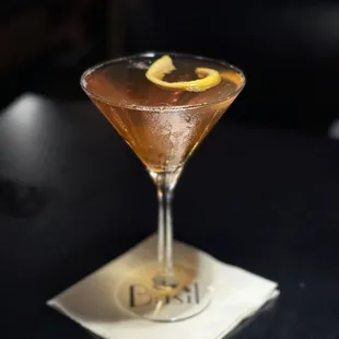 Black manhattan with orange