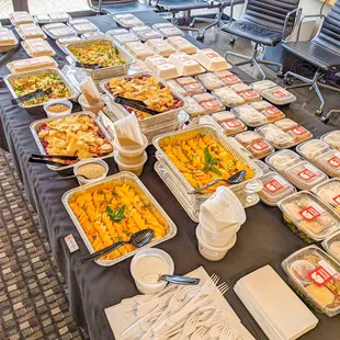 Catered lunch! Both individual meals and family style trays, which are great for sharing sides and desserts like the mango sticky rice.
