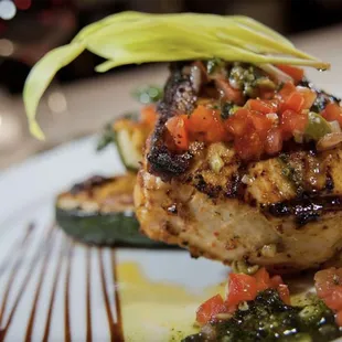 A symphony of flavors on a plate. Immerse yourself in a culinary journey with our exquisite dish at Basile Fine Italian Kitchen.