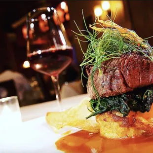 A tantalizing duo: succulent meat paired with the finest wine. Delight in a perfect harmony of flavors at Basile Fine Italian Kitchen.