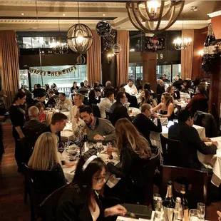 Indulge in an inviting ambiance and delightful company at Basile Fine Italian Kitchen.