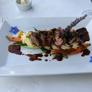 Duck breast with a blueberry lavender port wine reduction. So good I could cry!