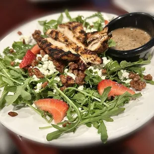 Side strawberry balsamic salad with blackened chicken
