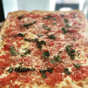 a square pizza on a table