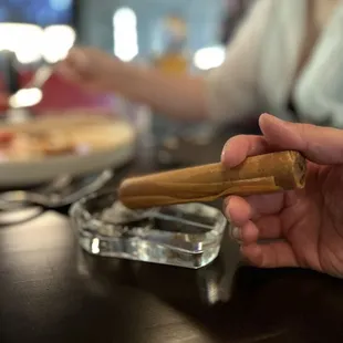 Smoked cigar (duck mousse, sesame-truffle ash)