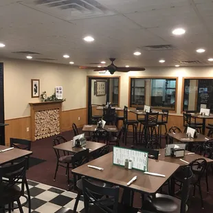 a restaurant with tables and chairs