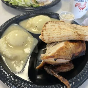 2 piece white chicken w/ double mashed potatoes and a pita with butter