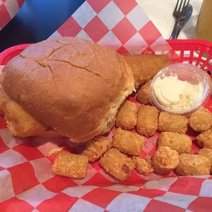 Fish sandwich with side of tater tots