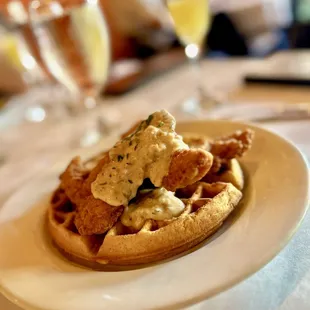 a waffle with sauce on it