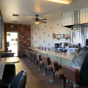 a man sitting at the counter