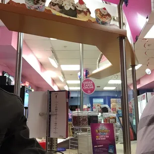 a display of cupcakes in a store