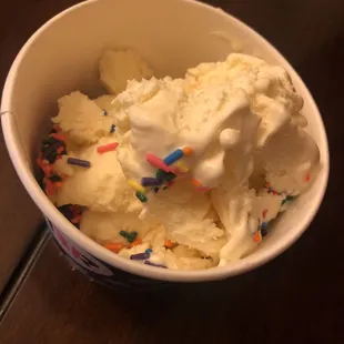 a bowl of ice cream with sprinkles