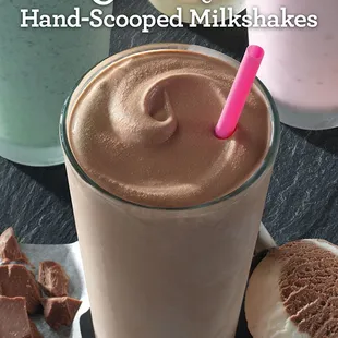 a chocolate milkshake with a pink straw