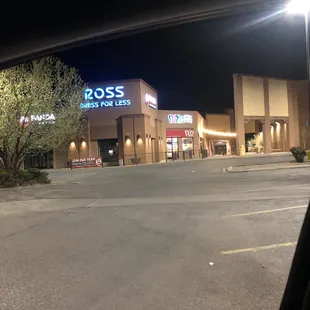 the outside of a store at night