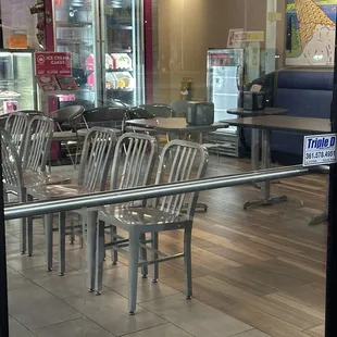 Chairs blocking dining area and bathrooms
