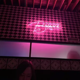 a neon sign in a restaurant