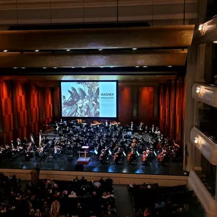 stage with orchestra and audience
