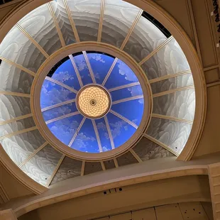 a circular skylight in the ceiling