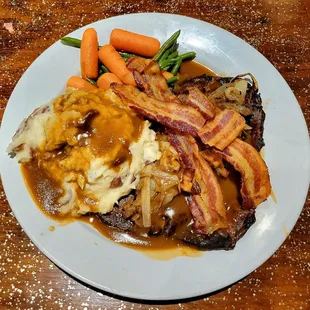 Grilled Calves Liver with bacon, mashed potatoes, carrots, and green beans.