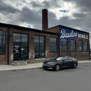 a car parked in front of a building