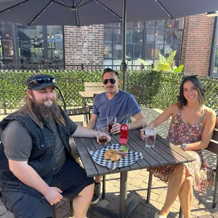 Outdoor patio vibes with great beer, food and friends!