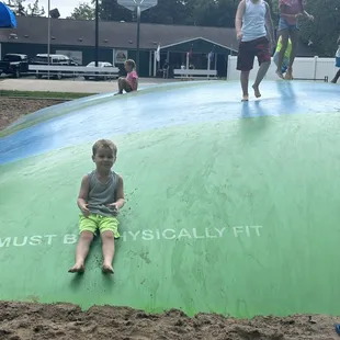 Huge Jump pillow located by the activity center and pool