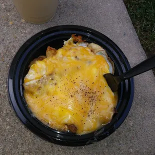Breakfast bowl with bacon and cheddar cheese. So good!