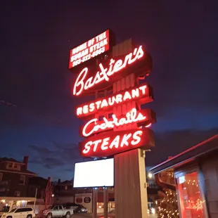 a neon sign for a restaurant