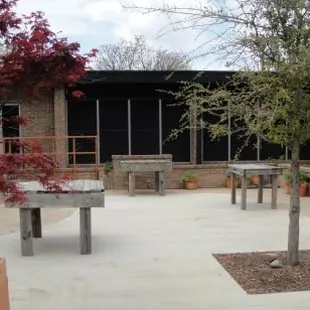 The Bastion's patio leading out to the herb gardens.  Many herbs used are grown on property.