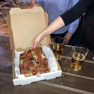 Pizza and a brew, what a combo!