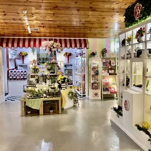 the inside of a store with many items on display
