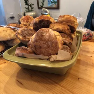 Salted and plain bread loaves. Biscuits are in front.