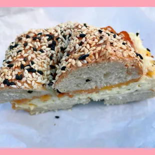 Bodega $11, on choice of bagel (this one is sesame); bacon, egg and cheddar.