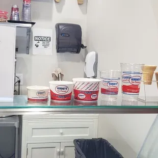 a display of ice creams and ice cream cones