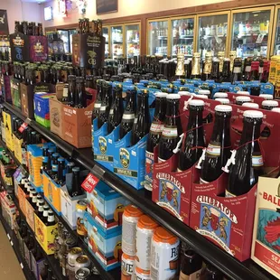 a wide selection of beer bottles