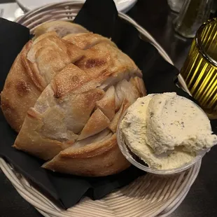 Hot fresh sourdough w/ whipped garlic butter It was gritty, asked for regular butter, it was cold &amp; rock hard.No butter packets??
