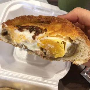 Inside of egg curry and cheese bread