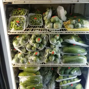 a refrigerator full of vegetables