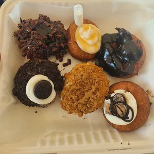 Chocolate trio, tres leches, chocolate icing, oreo, biscoff, cookie dough