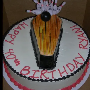 An over the hill 40th birthday bowling cake-for a bowling obsessed friend. Sara was great at translating my ideas into a cake!