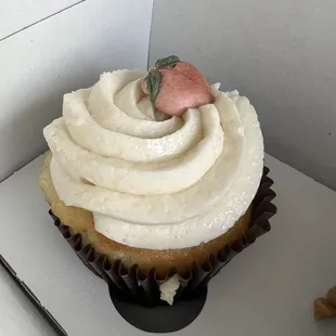 Peaches and cream cupcake
