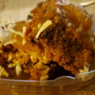 2 pieces of the tiniest carrot carrot cake in the standard small clam shell take out container, price vs size is a total fail